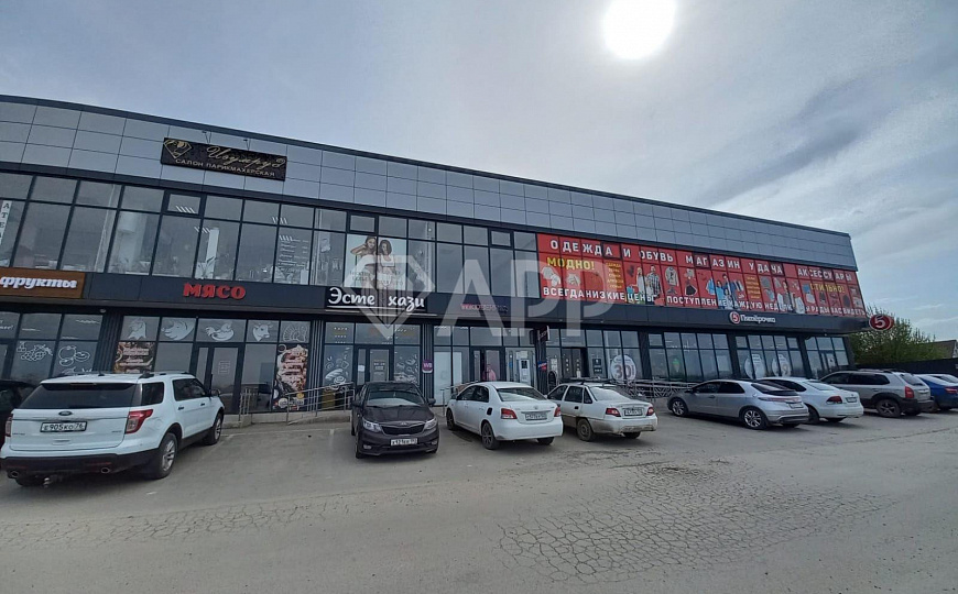 Продам готовый арендный бизнес, 1/2 долю помещения 500 кв м в торговом центре фото
