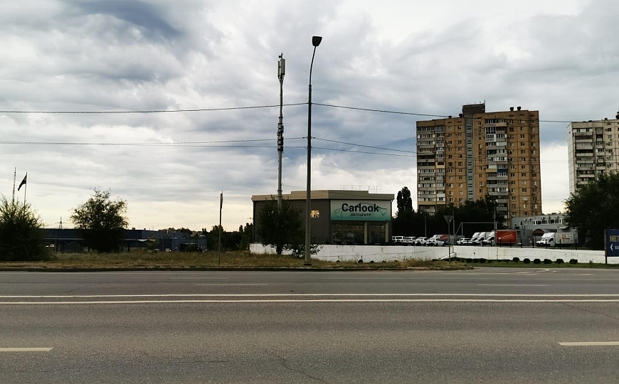 Здание под автоцентр, гипермаркет с парковкой 1 459 м² фото