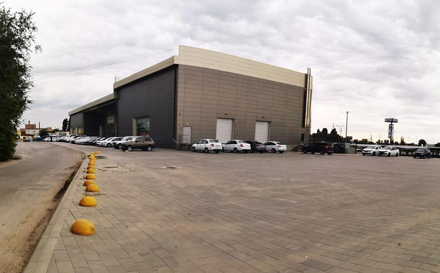 Здание под автоцентр, гипермаркет с парковкой 1 459 м² фото